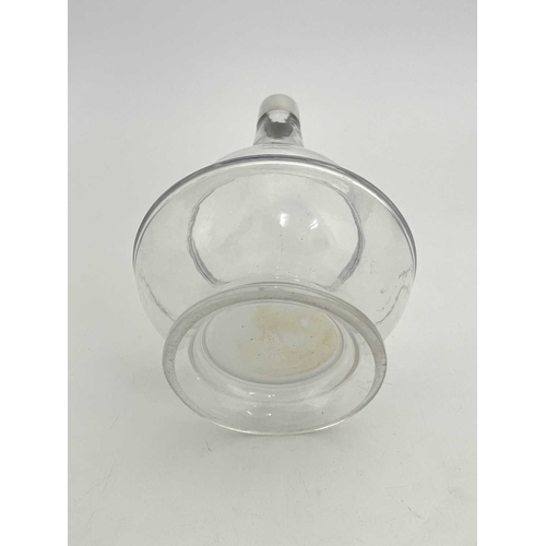 84 - A George V silver mounted glass decanter, double ogee gourd form with deep foot, silver pommel and c... 