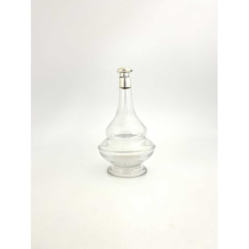 84 - A George V silver mounted glass decanter, double ogee gourd form with deep foot, silver pommel and c... 