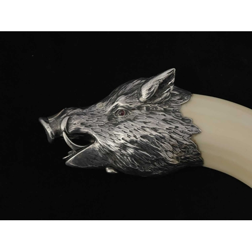 85 - An Austrian novelty silver mounted and boars tusk cigar cutter, Georg Anton Scheid, Vienna circa 190... 