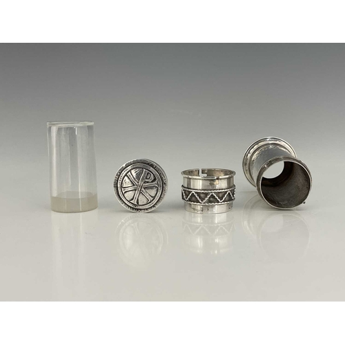 95 - An Arts and Crafts silver oil stock and pyx, Greenwood and Watts, London 1917, planished cylindrical... 