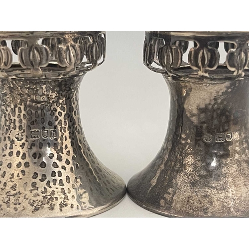 96 - A pair of Arts and Crafts silver pedestal salt cellars, William Hutton and Sons, London 1903, planis... 