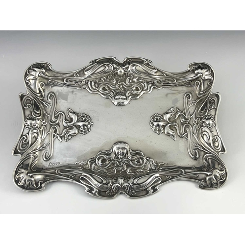 98 - An Arts and Crafts silver tray, William Aitken, Chester 1901, ogee rimmed rectangular form, embossed... 