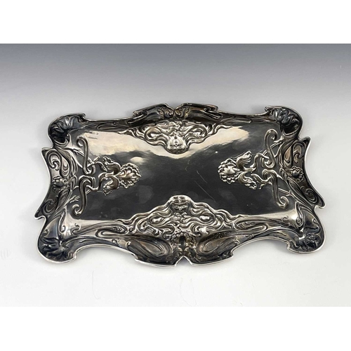 98 - An Arts and Crafts silver tray, William Aitken, Chester 1901, ogee rimmed rectangular form, embossed... 