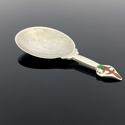 106 - Archibald Knox for Liberty and Co., an Arts and Crafts silver and enamelled caddy spoon, Birmingham ... 