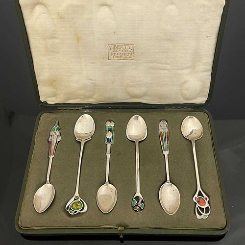 107 - Archibald Knox for Liberty and Co., a harlequin set of six Cymric Arts and Crafts silver and enamell... 