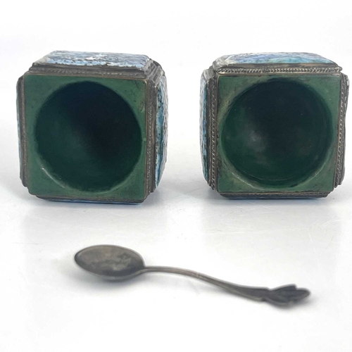 110 - A pair of Arts and Crafts enamelled and silver plated salt cellars, circa 1910, cuboid form each wit... 