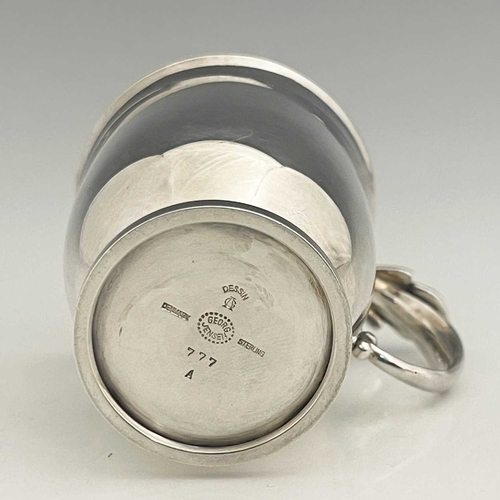 118 - Gundorph Albertus for Georg Jensen, a Cactus pattern silver mug, model 777, import marks London 1961... 