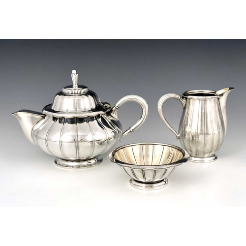 119 - Johan Rohde (attributed) for WMF, a Jugendstil silver plated three piece tea set, circa 1912, lobed ... 