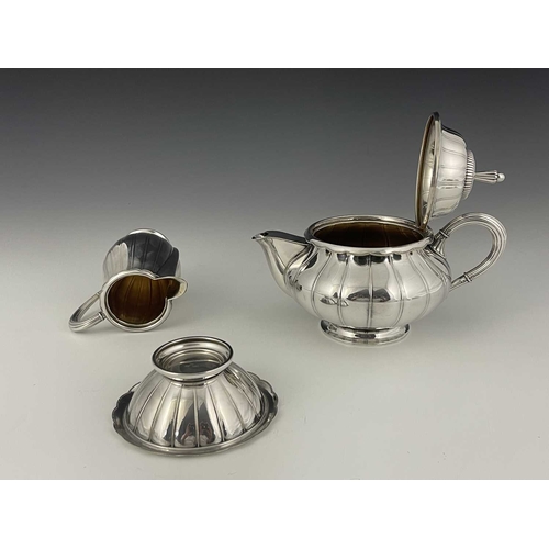 119 - Johan Rohde (attributed) for WMF, a Jugendstil silver plated three piece tea set, circa 1912, lobed ... 