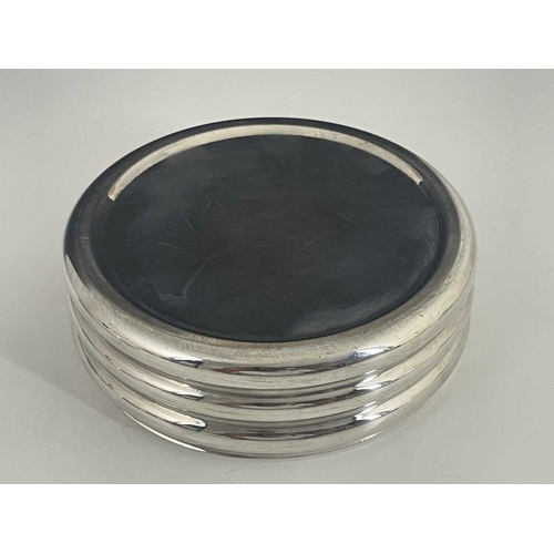 127 - An Art Deco silver plated box and cover, Sheffield circa 1935, squat cylindrical drum form, concentr... 