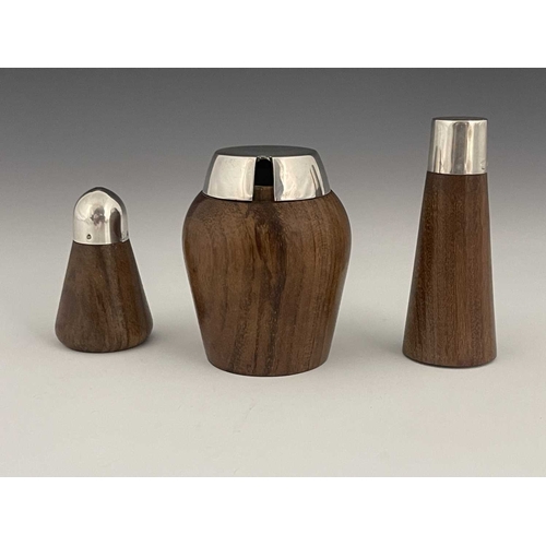 130 - A Spanish Modernist silver and walnut three piece cruet, circa 1960s, including mustard pot, salt sh... 