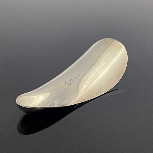 131 - Allan Scharff for Georg Jensen, a Modernist silver shoe horn, model 475, organic form, 10cm long, 1.... 