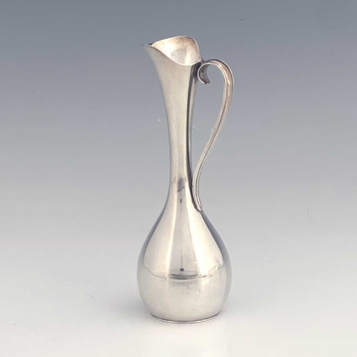 132 - Jorgen Steffensen, a Danish Modernist silver plated vase, circa 1960, of single handled jug form, bu... 