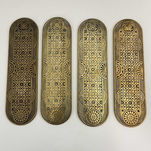 136 - A set of four Aesthetic Movement gilt brass door plates, William Tonks and Sons, circa 1878, cast wi... 