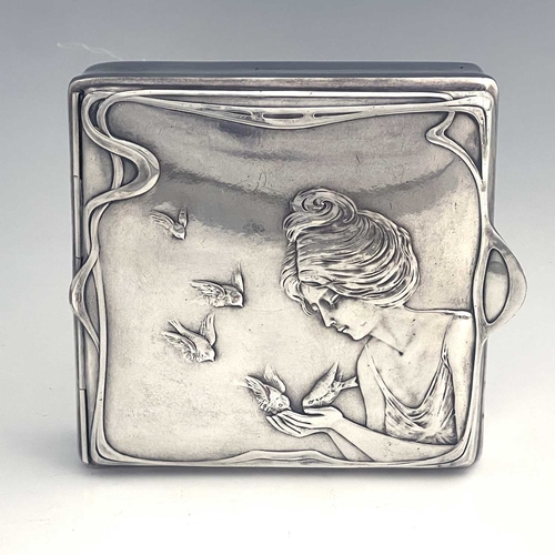 145 - An Art Nouveau silver plated box, in the style of WMF, square section, the hinged lid cast in relief... 