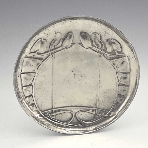 147 - Archibald Knox for Liberty and Co., a Tudric Arts and Crafts pewter plate, model 0231, circular form... 