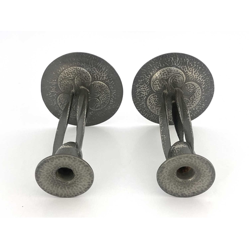 148 - Archibald Knox for Liberty and Co., a pair of Tudric Arts and Crafts pewter candlesticks, model 0223... 