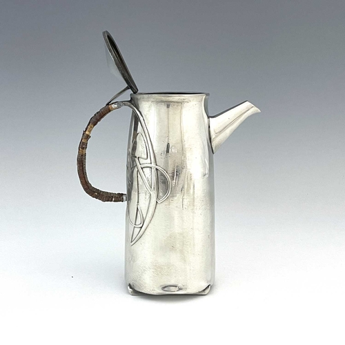 149 - Archibald Knox for Liberty and Co., a Tudric Arts and Crafts pewter coffee pot, model 0231, tapered ... 