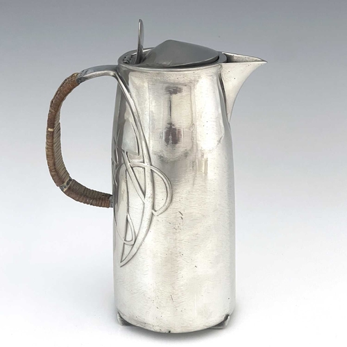 153 - Archibald Knox for Liberty and Co., a Tudric Arts and Crafts pewter hot water jug, model 0231, taper... 