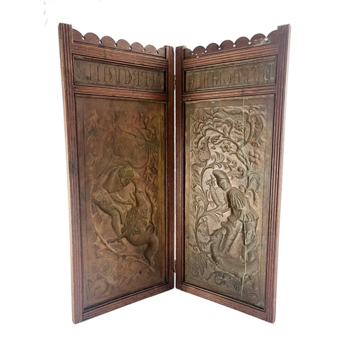 160 - Keswick School Industrial Arts, an Arts and Crafts embossed copper bi-fold screen, fluted walnut fra... 