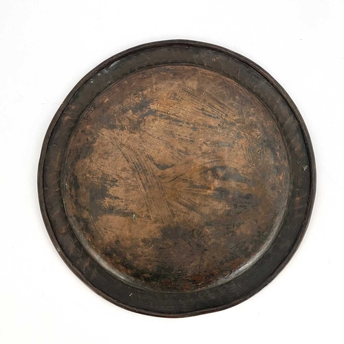 161 - Hugh Wallis, two large Arts and Crafts copper trays, one circular with ropetwist border, the other o... 