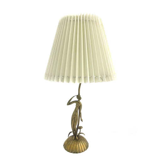 164 - Karl Hagenauer, an Art Deco figural table lamp, circa 1940, modelled as a nude woman on a desert isl... 