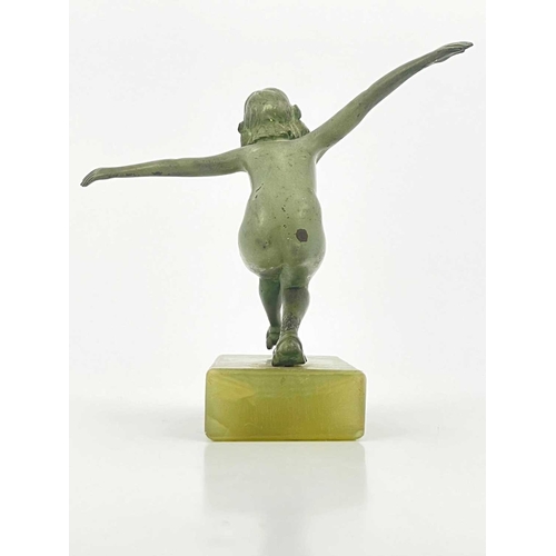 180 - An Art Deco bronze figure, circa 1925, modelled as a nude woman roller skating, verdigris patination... 