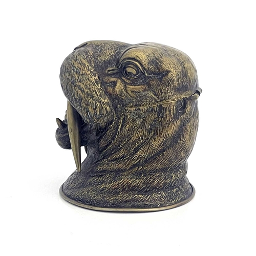 188 - A novelty brass inkwell, circa 1880, realistically modelled as a walrus head, mouth open, 10.5cm hig... 