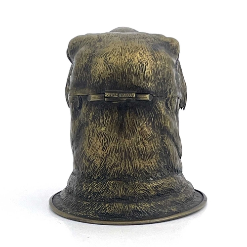 188 - A novelty brass inkwell, circa 1880, realistically modelled as a walrus head, mouth open, 10.5cm hig... 