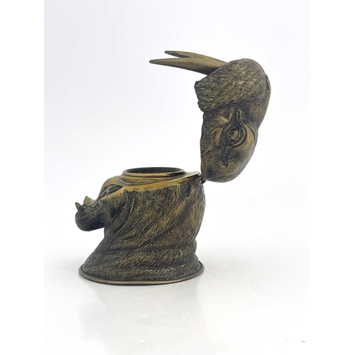 188 - A novelty brass inkwell, circa 1880, realistically modelled as a walrus head, mouth open, 10.5cm hig... 