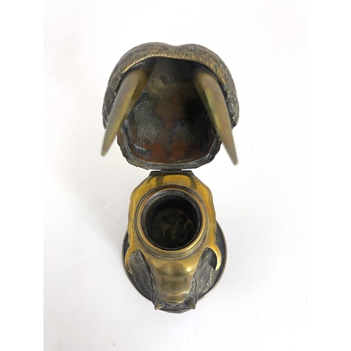 188 - A novelty brass inkwell, circa 1880, realistically modelled as a walrus head, mouth open, 10.5cm hig... 