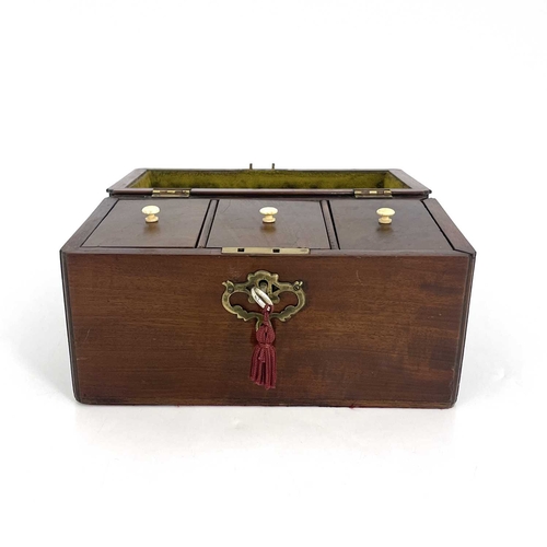 189 - A George II mahogany tea caddy, circa 1740, 'C' scroll brass swing handle, moulded caddy top, fretwo... 