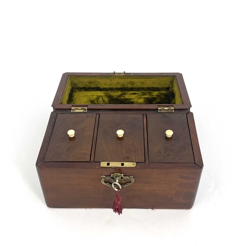 189 - A George II mahogany tea caddy, circa 1740, 'C' scroll brass swing handle, moulded caddy top, fretwo... 