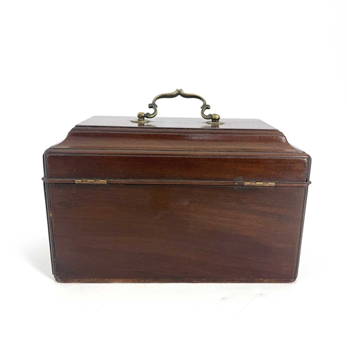 189 - A George II mahogany tea caddy, circa 1740, 'C' scroll brass swing handle, moulded caddy top, fretwo... 