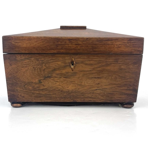 192 - A Regency rosewood tea caddy, circa 1820, of sarcophagus form, fitted interiors with twin lidded com... 