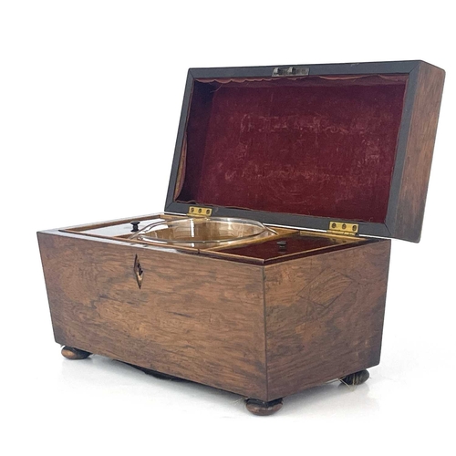 192 - A Regency rosewood tea caddy, circa 1820, of sarcophagus form, fitted interiors with twin lidded com... 