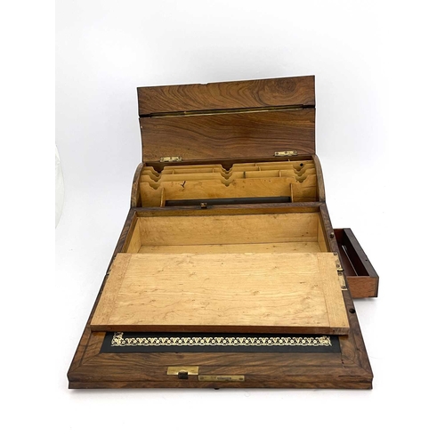 193 - A mid-Victorian burr walnut writing slope, circa 1860, of serpentine form, pierced brass Gothic moun... 