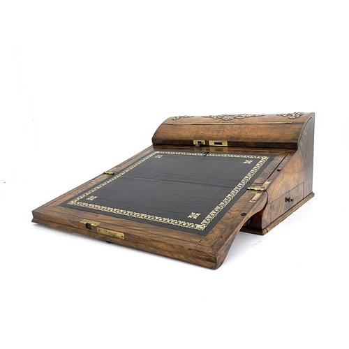 193 - A mid-Victorian burr walnut writing slope, circa 1860, of serpentine form, pierced brass Gothic moun... 