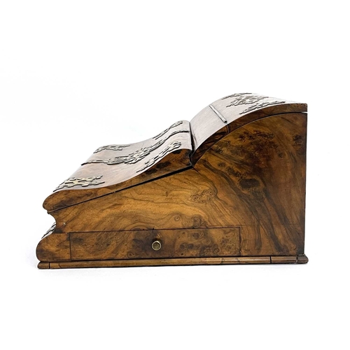 193 - A mid-Victorian burr walnut writing slope, circa 1860, of serpentine form, pierced brass Gothic moun... 