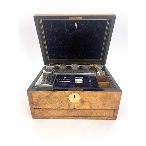 196 - A Victorian burr walnut dressing case, domed top with inset vacant brass cartouche and escutcheon, f... 