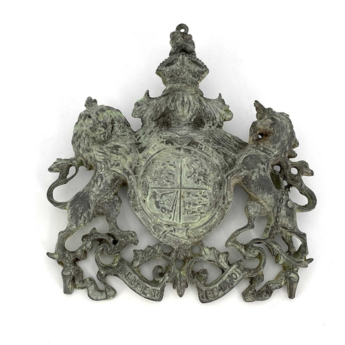 217 - A Victorian cast lead Royal coat of arms plaque, modelled in relief and pierced, Royal Warrant type,... 