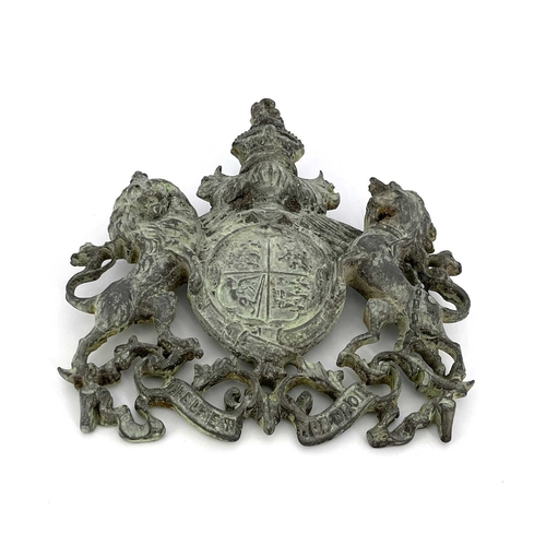 217 - A Victorian cast lead Royal coat of arms plaque, modelled in relief and pierced, Royal Warrant type,... 