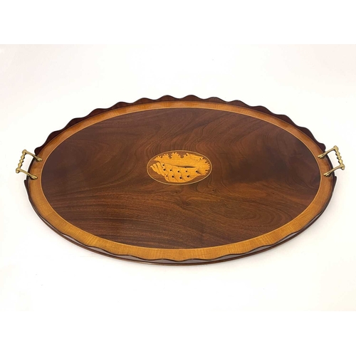 223 - A George III mahogany and boxwood inlaid twin handled tray, oval form, with wave cut gallery enclosi... 