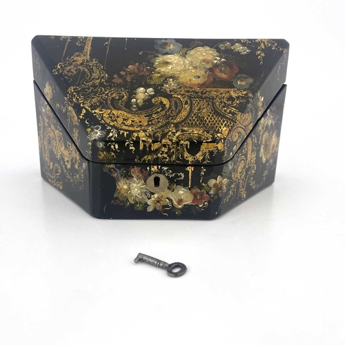 227 - A mid-Victorian papier mache stationery casket, circa 1860, of tapered fall-front form with florally... 