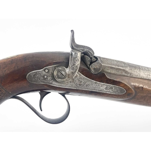 247 - A 19th century officers percussion pistol, by Moore London, engraved to the plates with foliate scro... 