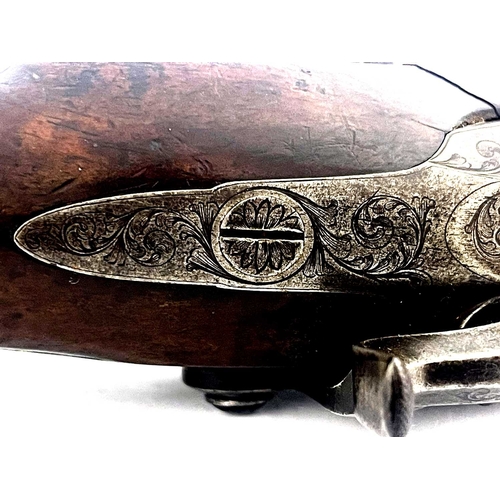 247 - A 19th century officers percussion pistol, by Moore London, engraved to the plates with foliate scro... 