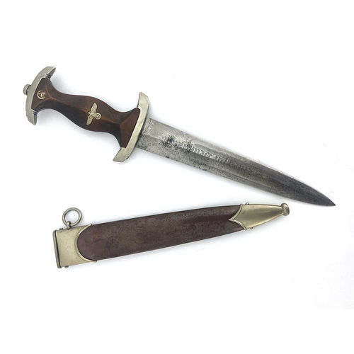 249 - A German WWII SA dagger, by Eickhorn, copper sheath and carved wooden handle inlaid with Third Reich... 