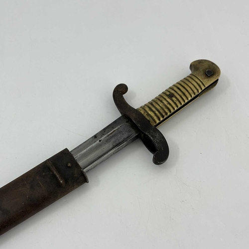 258 - A French M1874 Gras sword bayonet, two piece wooden grip, housed in steel scabbard, foundry marks to... 