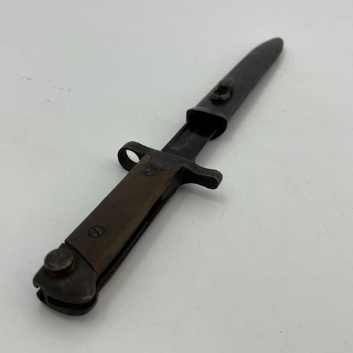 259 - An Italian M1938 Mannlicher-Carcano knife bayonet, two piece wooden grip, housed in blackened steel ... 