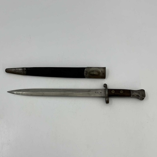 260 - Two British bayonets, a First World War British 1907 pattern SMLE bayonet by Wilkinson, two piece wo... 